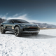 A render of the teal Audi Activesphere concept on a salt flat.